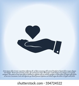 heart in hand vector icon