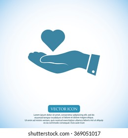heart in hand vector icon