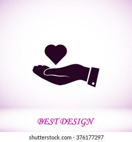 heart in hand vector icon