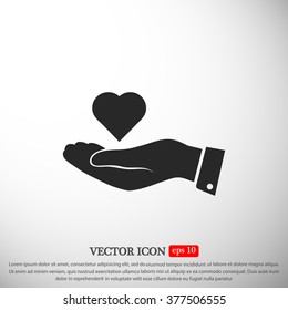 heart in hand vector icon