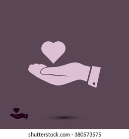 heart in hand vector icon