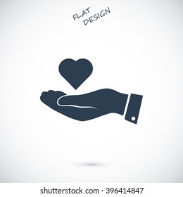 heart in hand vector icon