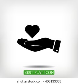 heart in hand vector icon
