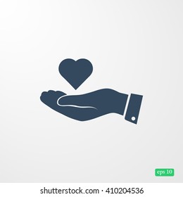 heart in hand vector icon