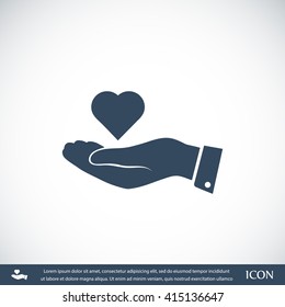 heart in hand vector icon