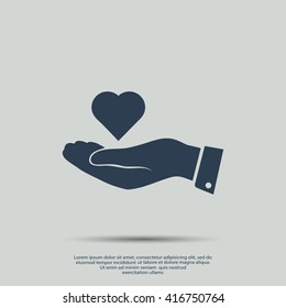 heart in hand vector icon