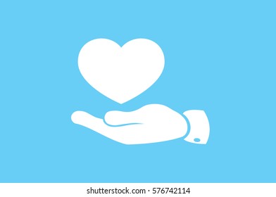 Heart in hand vector icon 