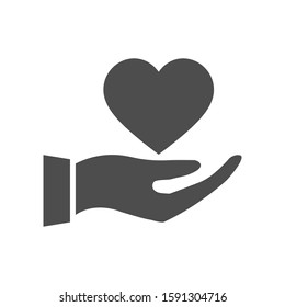 Heart in the hand vector icon isolated on the white background