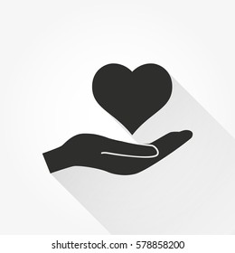 Heart in hand vector icon with long shadow. Black illustration isolated on white background for graphic and web design.