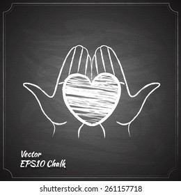 heart in hands chalk painted on the chalkboard medicine symbol vector illustration