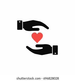 Heart in hands icon. Vector isolated illustration.