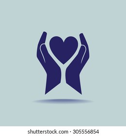 Heart in the hands vector icon