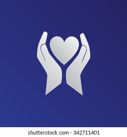 Heart in the hands vector icon