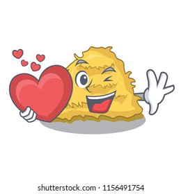 With heart hay bale mascot cartoon