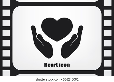 Heart icon in the hands vector.