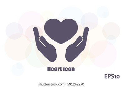 Heart icon in the hands vector.