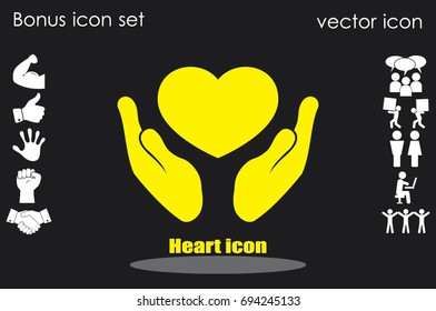 Heart icon in the hands vector.