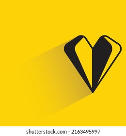 heart icon with shadow on yellow background