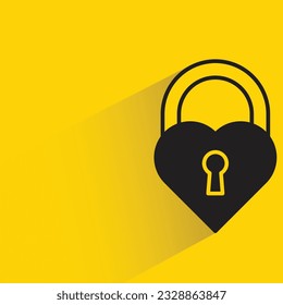 heart key with shadow on yellow background