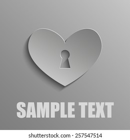 Heart with a keyhole on a gray background