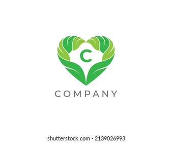 Heart and Leaf Logo sign icon symbol Design with Letter C. Vector logo template