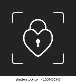 heart lock, padlock. simple silhouette. White object in camera autofocus on dark background