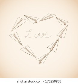 Heart made of doodled paper planes. Valentines day greeting card