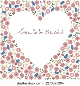 heart made floral frame with handwritten lettering love is in the air vector isolated