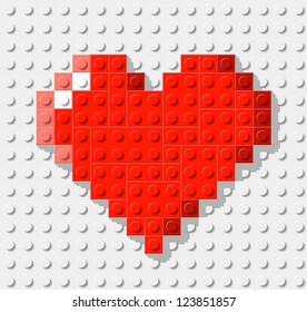 Heart made from plastic construction blocks