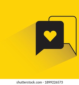 heart message with drop shadow on yellow background