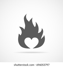 Heart on fire, isolated on light background. Heart in flame, in flat design. Vector illustration
