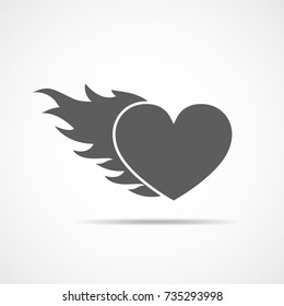 Heart on fire, isolated on light background. Heart in flame, in flat design. Vector illustration