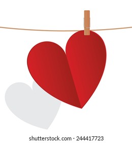 Heart on rope with clip on white background