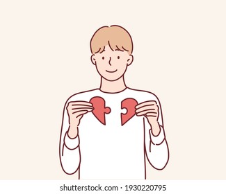 Heart from parts of a puzzle. Hand drawn style vector design illustrations.