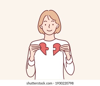 Heart from parts of a puzzle. Hand drawn style vector design illustrations.