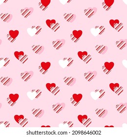 Heart pattern, candy cane, peppermint striped textured hearts seamless background