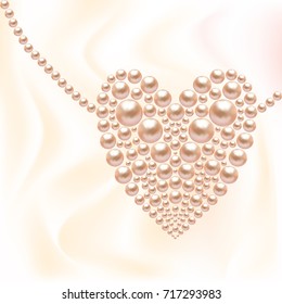 Heart of pearls. St. Valentine's Day. Pink beads. Necklace in the shape of heart.
