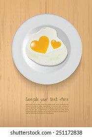  heart with plate on wood background.