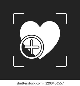 heart and plus. simple silhouette. White object in camera autofocus on dark background