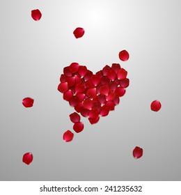  heart of red rose petals . valentine`s card with heart on the white background