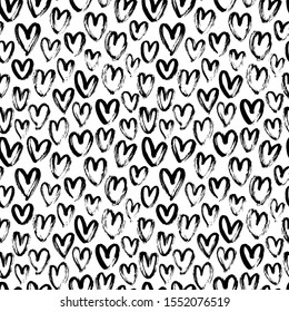 Heart seamless pattern. Black and white ink brush hearts hand drawn ornament. Romantic figures vector illustration. Monochrome freehand dry paint brush stroke shapes. Decorative textile, wallpaper