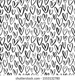 Heart seamless pattern. Black and white ink brush hearts hand drawn ornament. Romantic figures vector illustration. Monochrome freehand dry paint brush stroke shapes. Decorative textile, wallpaper