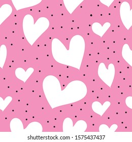 Heart seamless pattern. Cute pattern with pink hearts. Babies fashion. Vector illustration.Hand drawn.