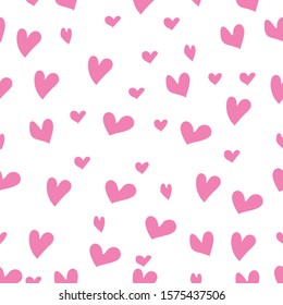 Heart seamless pattern. Cute pattern with pink hearts. Babies fashion. Vector illustration.Hand drawn.