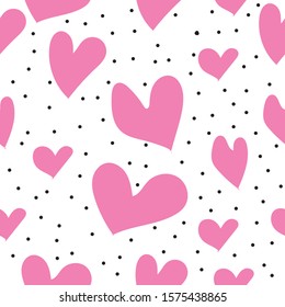 Heart seamless pattern. Cute pattern with pink hearts. Babies fashion. Vector illustration.Hand drawn.