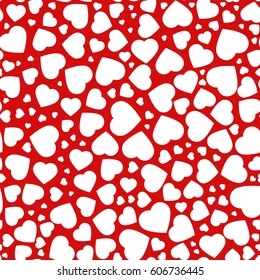 Heart, seamless pattern of the icons of hearts in different sizes. Background from flat white heart on red background, template for greetings cards.