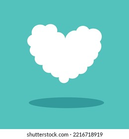 A heart shape of cloud on a green background.