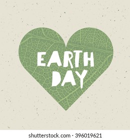 Heart shape with green leaf veins texture. Nature concept template. Green leaf veins texture heart shaped on the recycled paper texture.