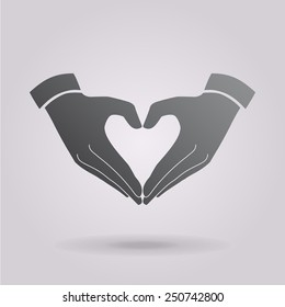 Heart shape made with hands.  The illustration on gray background.
