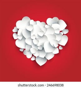 Heart shape made from smaller hearts on red background | Valentine's day card